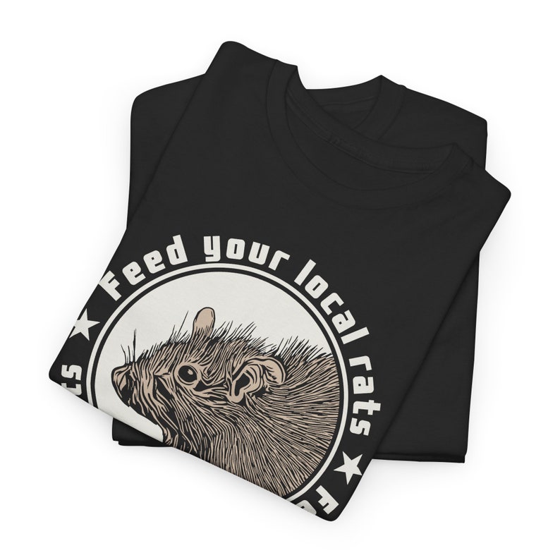 May include: Black t-shirt with a white circle graphic featuring a rat and the text "Feed your local rats".