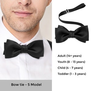 Elegant style black silk satin bow tie for man.
Elegante Fliege aus schwarzem Seidensatin fur Herren.
Noeud papillon en satin de soie noir de style elegant pour homme.