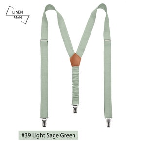 Light sage green color linen Y-type suspenders with metal clips. The back is attached with an elastic band and with light brown leather in the middle.