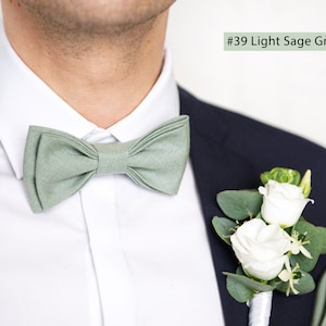 The front-view model wears a light sage green color linen bow tie and pocket square.