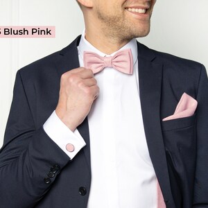 The front-view model wears a blush pink color linen bow tie, cufflinks, pocket square, and blush pink color linen suspenders.