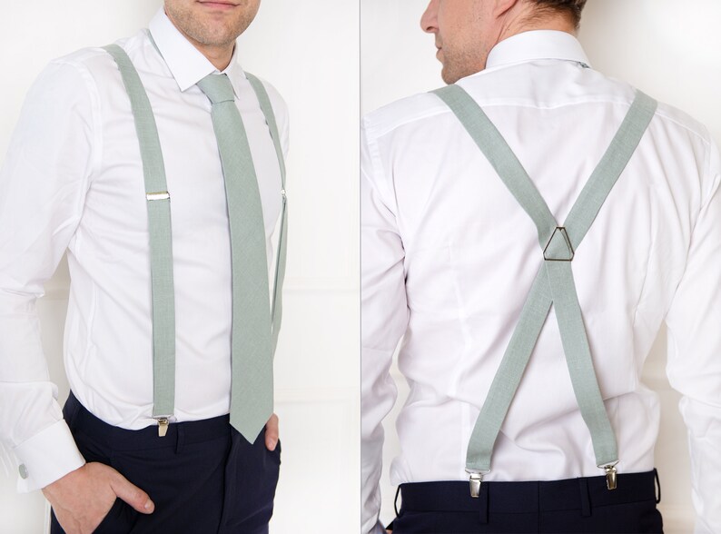 The front-view model wears a light sage green color linen necktie and light sage green color linen suspenders with clips. On the right, the same model from the back wears the same light sage green color linen X-type suspenders.