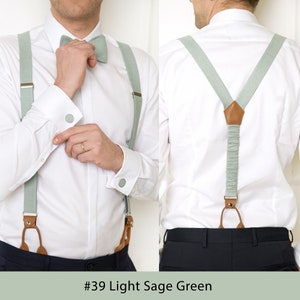 Light sage green bow tie, cufflinks, and suspenders.
Noeud papillon, boutons de manchette et bretelles vert sauge clair.
Hellsalbeigrune Fliege, Manschettenknopfe und Hosentrager.