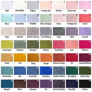 May include: A color chart with 49 fabric swatches, each labeled with a number and a German word. The swatches are arranged in rows and columns, and the colors range from white to black.