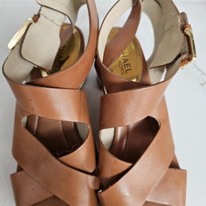 Vintage light brown leather Mirabella sandals made by Michael Kors in good vintage condition size 7.5