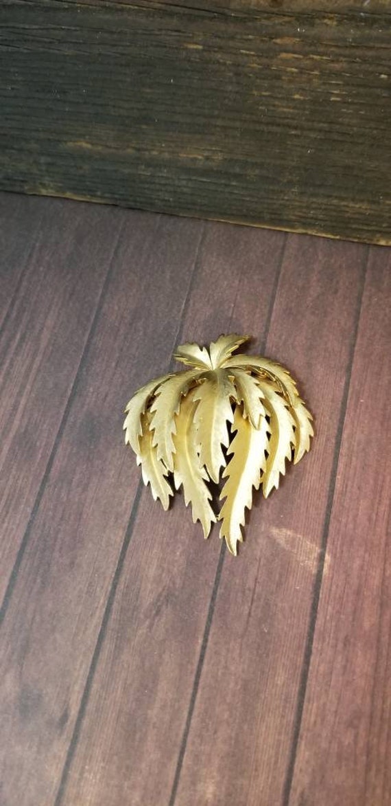 Vintage gold Trifari crown brooch, marijuana leaf… - image 4