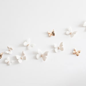 Witte en gouden porseleinen vlindermuurdecoratie voor huisdecoratie en cadeau-idee