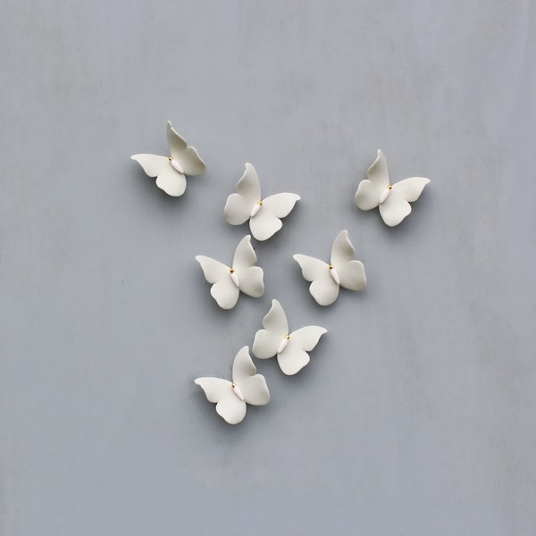 Petits papillons Pistaches en porcelaine pour décoration murale