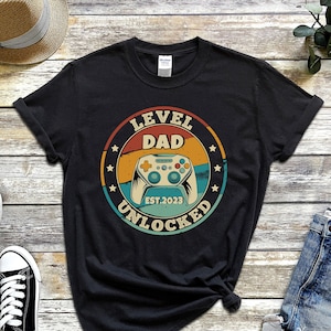 Leveled Up To Dad 2023 Shirt, Father&#39;s Day Gift, New Dad T-shirt, Daddy Shirt, Leveling Up, Promoted To Soon To Be Dad, Video Gamer Tshirt