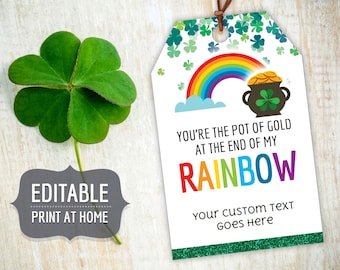 May include: Editable printable gift tag with a rainbow, pot of gold, and shamrocks. The text reads "You're the pot of gold at the end of my rainbow. Your custom text goes here."