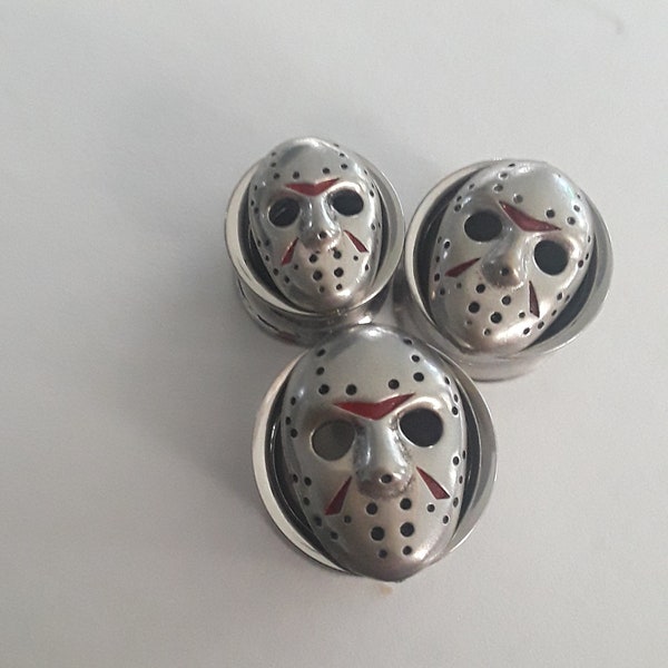 Ear tunnels/stretchers in the style of Jason Vorhees