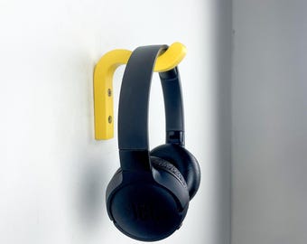 Gancio da parete giallo per cuffie: gancio in legno colorato e ondulato