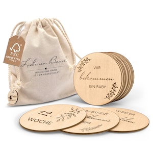 Wooden pregnancy milestone cards in German - 30 milestones on elegant wooden discs as a gift for pregnant women and expectant mothers.