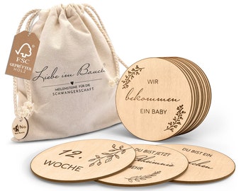 Wooden pregnancy milestone cards in German - 30 milestones on elegant wooden discs as a gift for pregnant women and expectant mothers.