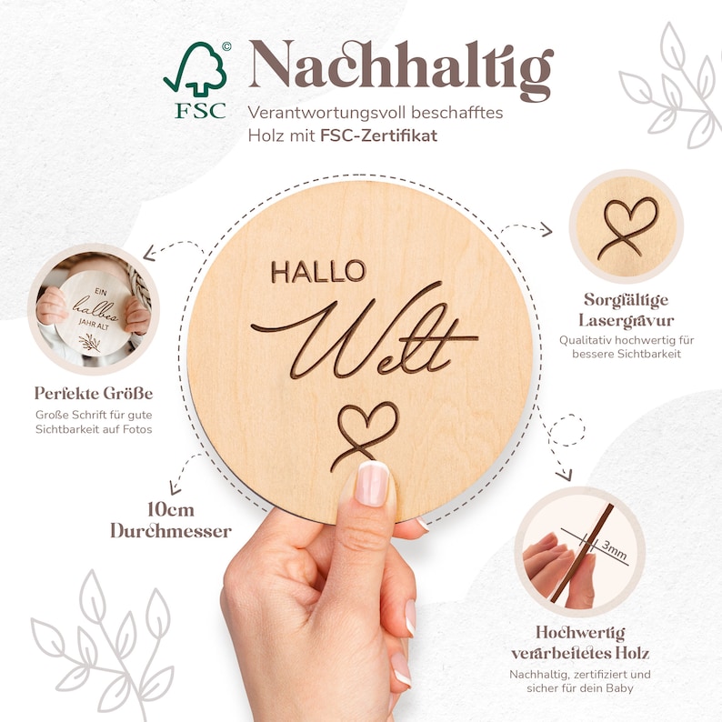 May include: A wooden round sign with the text "Hallo Welt" (Hello World) in cursive script and a heart symbol. The sign is 10 inches in diameter and made from sustainably sourced wood with an FSC certification.