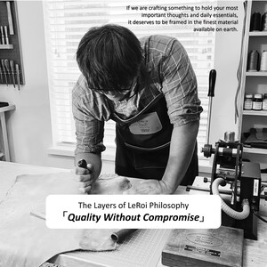May include: Black and white image of a person working with leather in a workshop. The text reads: "If we are crafting something to hold your most important thoughts and daily essentials, it deserves to be framed in the finest material available on earth." The text also reads: "Quality Without Compromise."