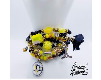 Joyas deportivas de Pittsburgh, pingüinos, negro y dorado