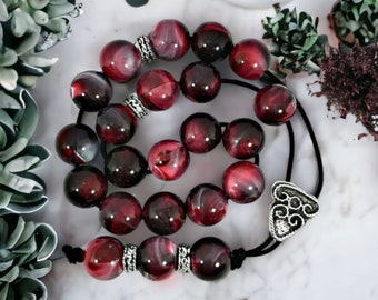 Greek Komboloi/ worry beads with red marble colored beads and silver details. Gifts for stress relief and alternative ways to quit smoking