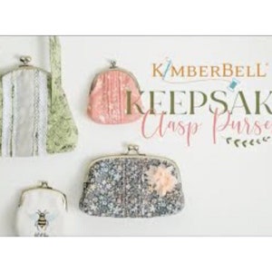 May include: Four different fabric purses with clasp closures. The purses are in various floral patterns and colors, including green, pink, and blue. The purses are arranged on a white background. The text "KIMBERBELL" and "KEEPSAKE Clasp Purses" is displayed above the purses.