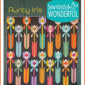 May include: Aunt Iris quilt pattern featuring a repeating floral design in various colors on a dark gray background. The quilt has a modern, geometric style with the text "Sew Kind of Wonderful" and "WCR Pattern".