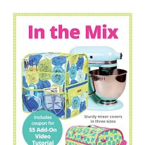 May include: A set of three colorful mixer covers with different patterns. The covers are made of fabric and have a handle for easy removal. The text "In the Mix" is at the top of the image. The text "Keep the mixer clean and the kitchen stylin'" is at the bottom of the image. The text "byannie.com" is in the bottom left corner of the image. The text "...what's in your bag?" is below the "byannie.com" text.