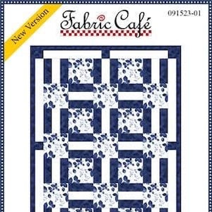 May include: A fabric panel with a blue and white floral pattern, framed by blue and white stripes. The text "Fabric Cafe" is at the top, with "Porch Rails" at the bottom. The finished quilt size is 45.5" x 60.5".