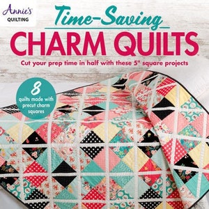 May include: A book titled "Time-Saving Charm Quilts" with a colorful quilt on the cover. The book cover features the text "Cut your prep time in half with these 5" square projects". The quilt is made with precut charm squares and features a variety of colors and patterns.
