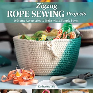 May include: A book titled "Zigzag Rope Sewing Projects: 16 Home Accessories to Make with a Simple Stitch" by Katherine Lile. The cover features a close-up of a white and teal rope basket filled with colorful fabric scraps. The book cover also shows three smaller images of other rope sewing projects, including a phone holder, a tote bag, and a set of coasters.