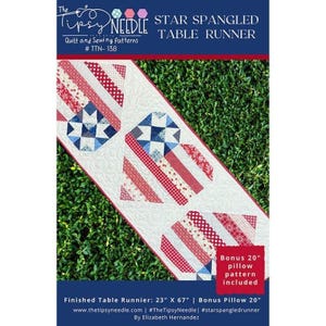 May include: A Star Spangled table runner quilt pattern with red, white, and blue star and stripe designs. The pattern includes a bonus 20-inch pillow pattern. The finished table runner measures 23" x 67".