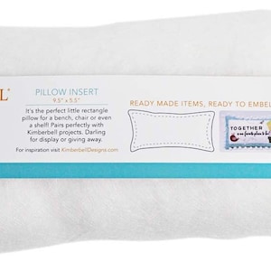May include: White pillow insert with a label that reads "Kimberbell Blanks Pillow Insert 9.5" x 5.5" Ready Made Items, Ready to Embellish KDKB206 9.5 x 5.5"