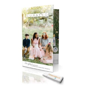 May include: A folded brochure with the title "Remarkable Curated" and a photo of four children sitting on a grassy field. The brochure is a thoughtful collection of resources for children and families.