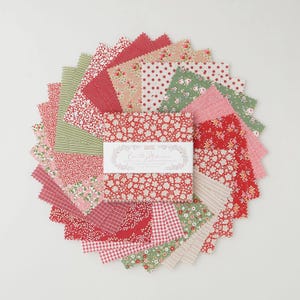 May include: A collection of fabric squares in various floral and patterned designs, including red, pink, and green. The squares are arranged in a circular pattern, with a central label that reads "Country Memories".