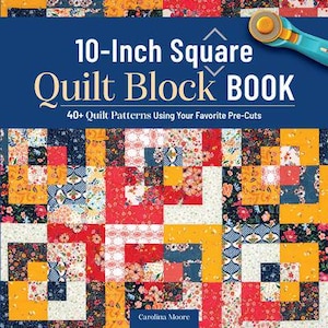 May include: A book titled "10-Inch Square Quilt Block BOOK" with a colourful quilt block pattern on the cover. The cover also features a rotary cutter and the text "40+ Quilt Patterns Using Your Favorite Pre-Cuts."
