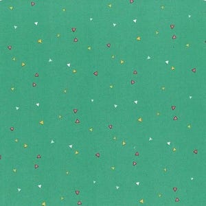 May include: A square, teal-colored fabric with a repeating pattern of small triangles. The triangles are in various colors, including white, yellow, and red, creating a playful and modern design. The fabric has a slightly textured appearance.