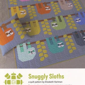 May include: A gray quilt and pillow set featuring colorful sloth designs hanging from branches. The sloths are in various colors, including pink, orange, and green. The quilt has a quilted pattern and the text "Snuggly Sloths".