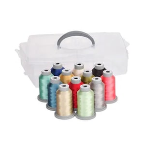 May include: A clear plastic storage case with a handle, containing 12 spools of embroidery thread in various colors, including red, green, blue, and yellow.