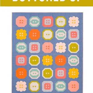 May include: A quilt pattern called "Buttoned Up" featuring a blue background with a variety of colorful buttons in different shapes and sizes. The pattern is for a large throw quilt and is described as a traditionally pieced quilt pattern for the advanced beginner sewist and up.