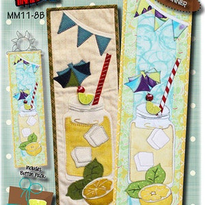 May include: A fabric panel with a lemonade theme, featuring a mason jar filled with yellow liquid, ice cubes, and a straw. The panel includes the text "Sippin' on Lemonade" and is available in 6" x 18" or 6" x 22" sizes. Skill level: Beginner.