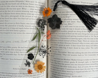 Laminated Orange and Black Pressed Flower Bookmark with Tassel - Spooky Bookish Decor - Halloween Inspired Floral Artwork - Gift for Readers