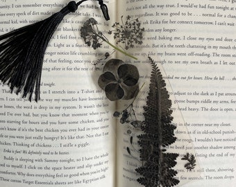 Laminated Black Pressed Flower Bookmark with Tassel - Spooky Reader Art - Gothic Decor for Bookshelf - Creepy Floral Gift - Nature Artwork