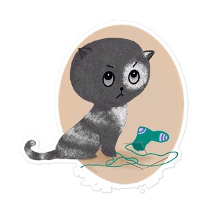 Chaton jouant avec une chaussette demi-tricotée Autocollants sans bulles