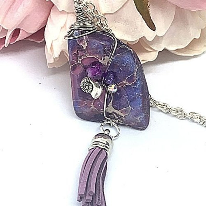 with adorable charms and chain necklaces Wrapped purple turquoise pendant