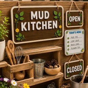 May include: A wooden mud kitchen sign with white text, accompanied by smaller signs labeled OPEN, CLOSED, and TODAY'S MENU with items like MUD PIE and LEAF SOUP. The set includes a wooden crate with kitchen utensils, a metal bucket, and a bowl.