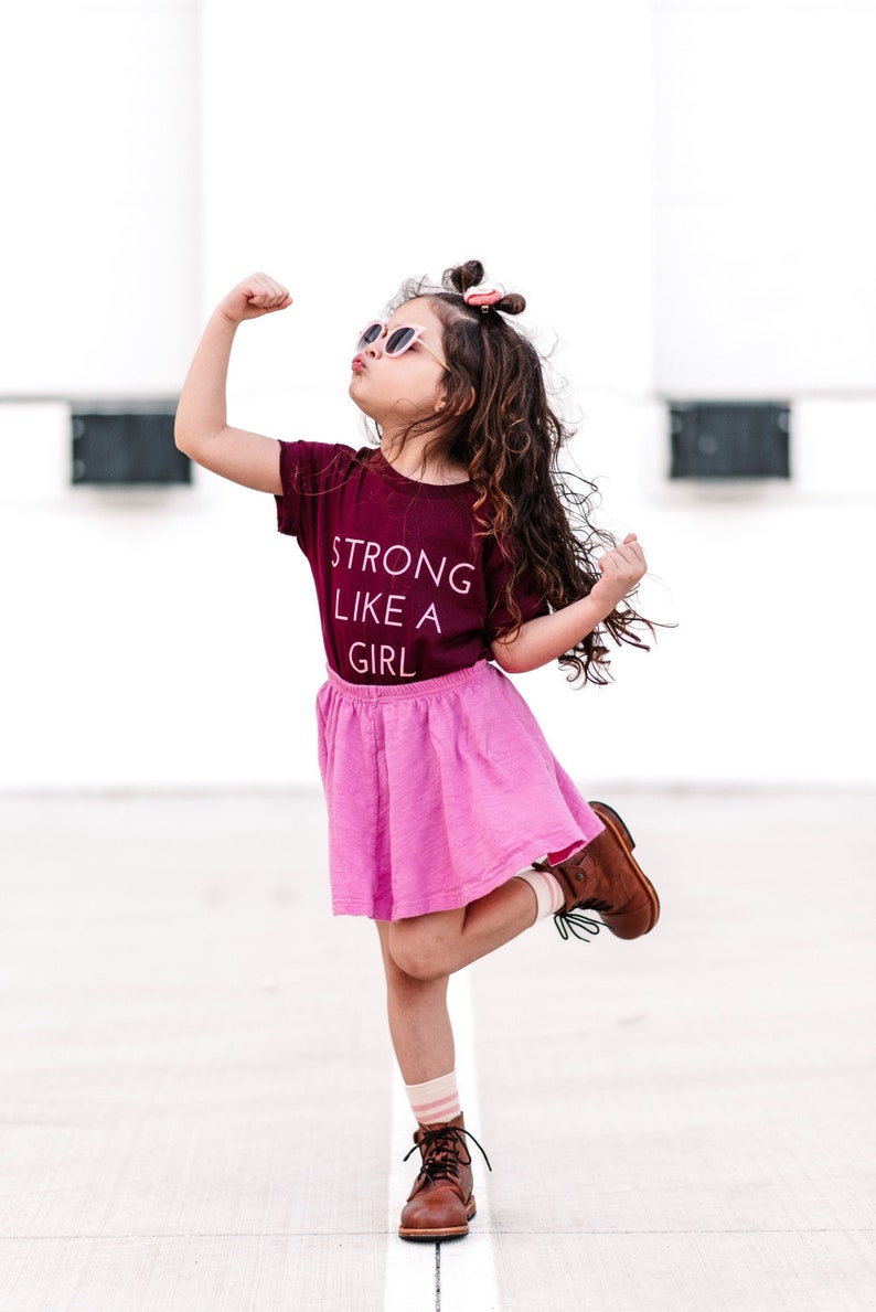 strong like a girl feminist t-shirt for toddlers