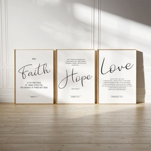 May include: Three framed art prints with inspirational quotes. The first print says "Faith" with the text "Is the substance of things hoped for, the evidence of things not seen." The second print says "Hope" and the third says "Love".