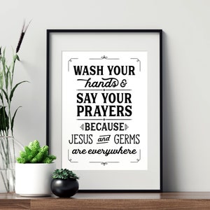 May include: Black and white typography print with the text "Wash your hands & say your prayers because Jesus and germs are everywhere".