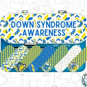 May include: A blue medical device with the words "DOWN SYNDROME AWARENESS" in white and blue. The device is decorated with blue and yellow patterns and includes several adhesive bandages with Down syndrome awareness designs.