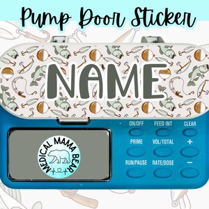 May include: A blue medical pump door sticker with the text "Pump Door Sticker" at the top. The sticker has a white top with a pattern of fish and fishing gear. The word "NAME" is printed in the center. The bottom of the pump has buttons.