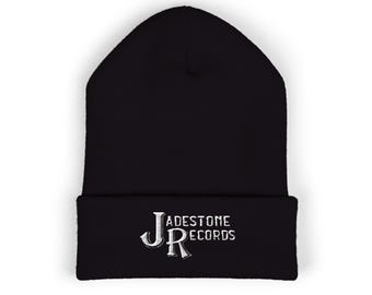 May include: Black beanie with a white embroidered logo that says "JADESTONE RECORDS" with a stylized "JR" in the center.