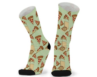 May include: A pair of green socks with a pizza slice pattern. The socks are black at the toes and heels.